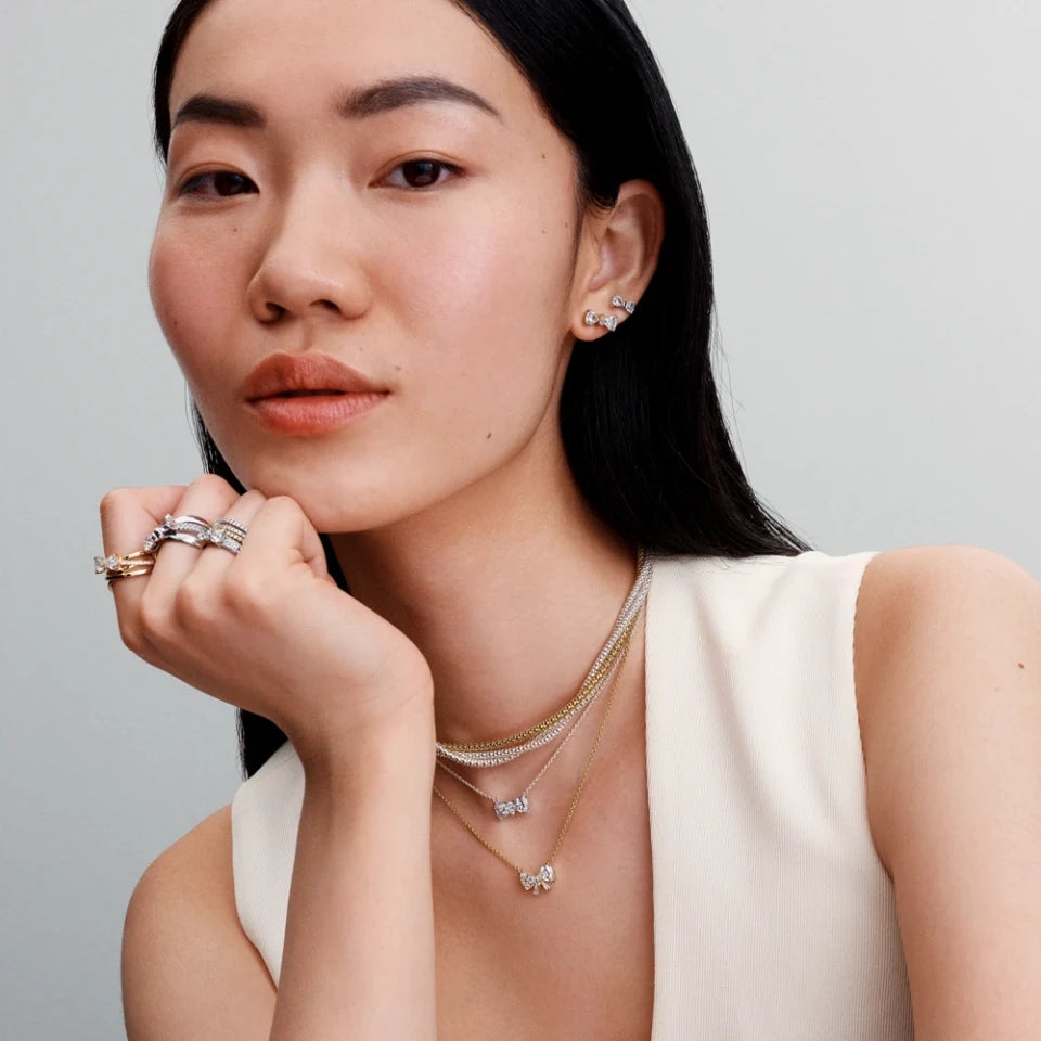 Каблучка Pandora Іскристий бант з покриттям позолоти